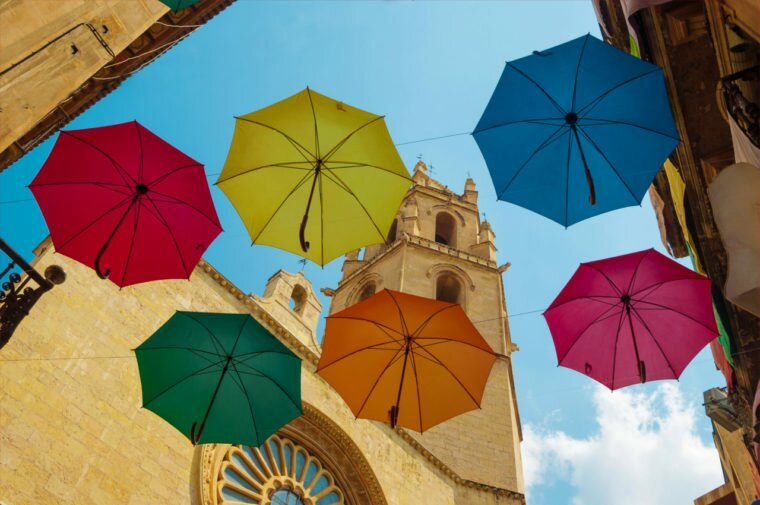 Colourful umbrellas in Reus, Spain. See more with a Reus Airport car hire.